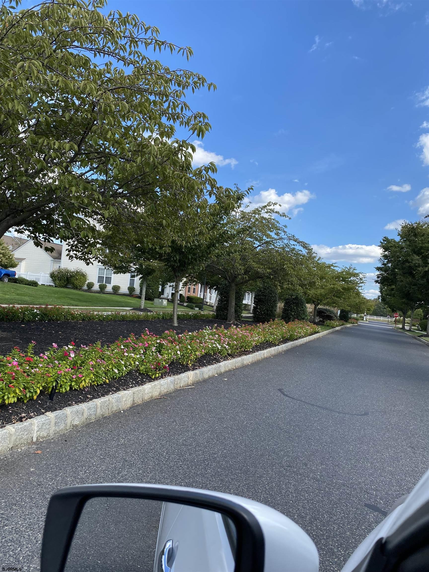 2 Old Mill Drive, Unit 2 Voorhees, NJ 08043 - Photo 19 of 20 a view of city street with a car parked in the background
