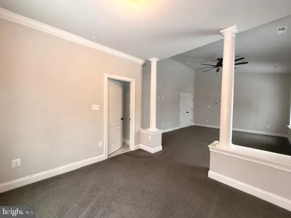 a view of a room with a fireplace