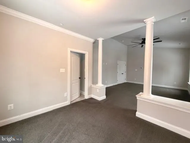 a view of a room with a fireplace