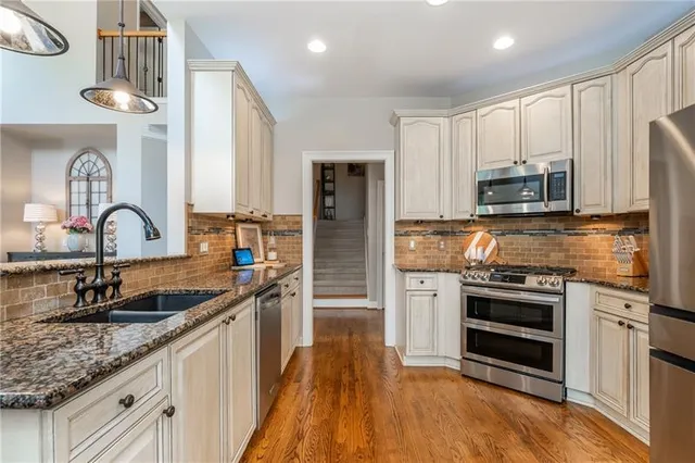 a living room with furniture fireplace and flat screen tv