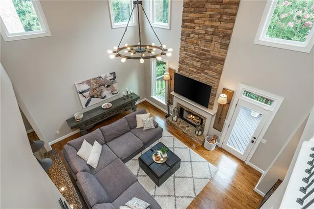 a spacious bathroom with a tub sink and mirror