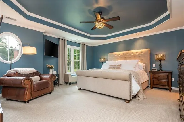 a workspace with furniture and a window