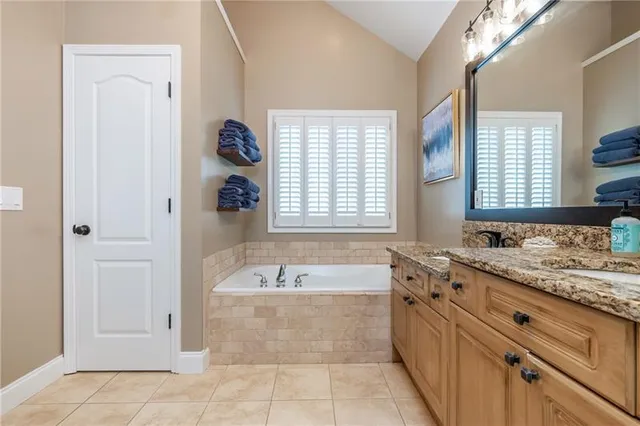 an empty room with a empty space and windows