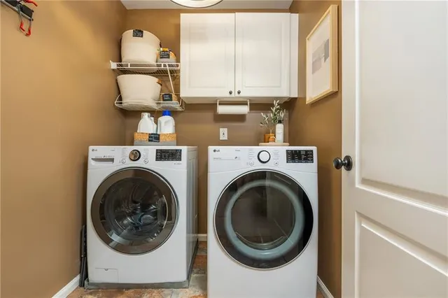 a view of a backyard with a sitting area