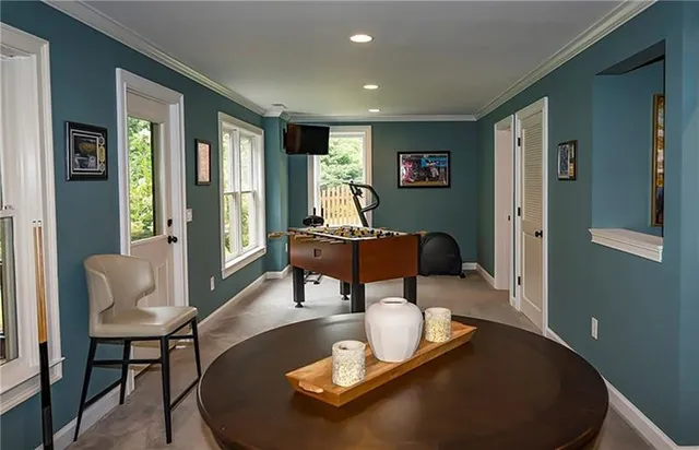 an aerial view of a house with outdoor space and street view