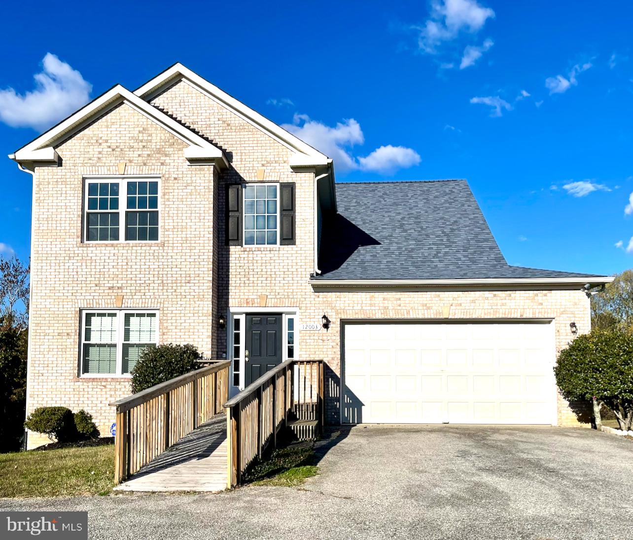 12003 Piscataway Road Clinton, MD 20735 - Photo 1 of 68 a view of a house with roof and sitting area