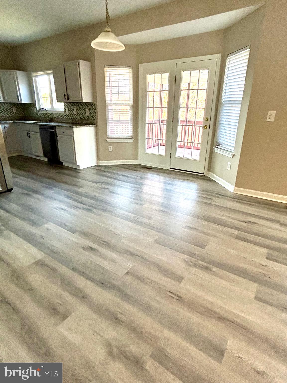 12003 Piscataway Road Clinton, MD 20735 - Photo 16 of 68 a view of an empty room with a window