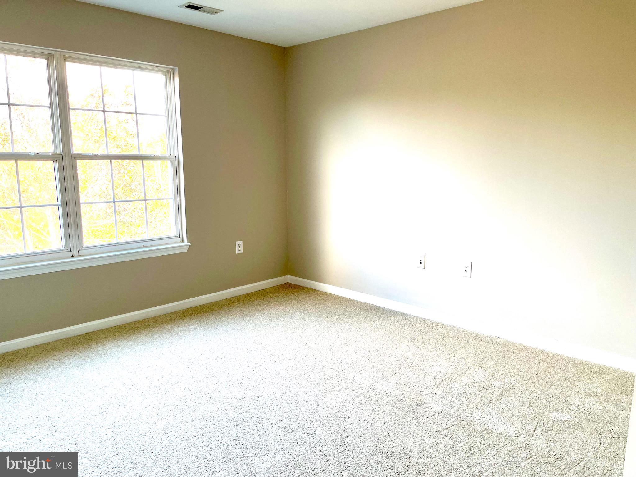12003 Piscataway Road Clinton, MD 20735 - Photo 29 of 68 an empty room with a window