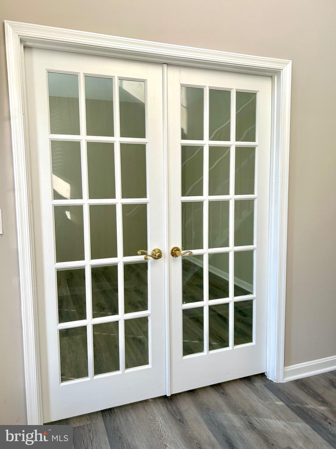 12003 Piscataway Road Clinton, MD 20735 - Photo 5 of 68 a view of an empty room with a window