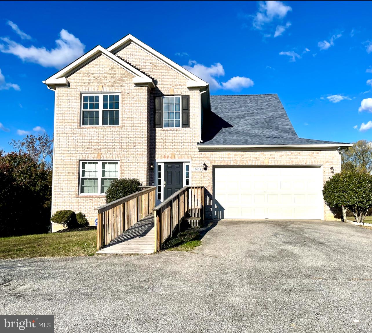 12003 Piscataway Road Clinton, MD 20735 - Photo 61 of 68 a view of a house with a street