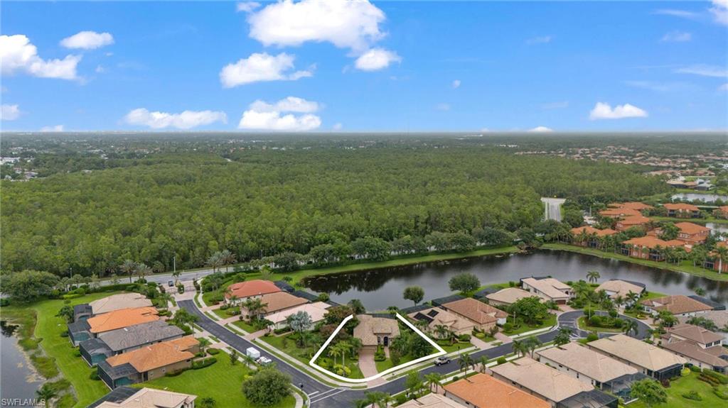 6155 Dogleg Drive Naples, FL 34113 - Photo 34 of 36 an aerial view of a house with a ocean view