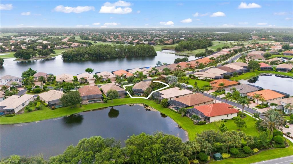 6155 Dogleg Drive Naples, FL 34113 - Photo 36 of 36 an aerial view of a houses with a lake view