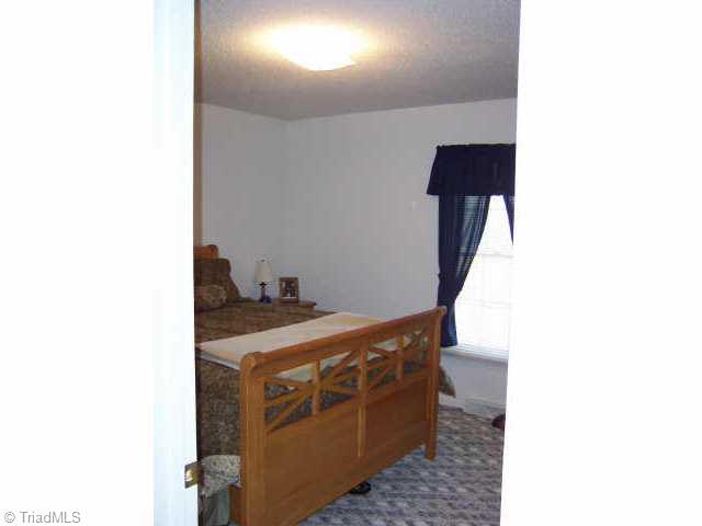 6580 Riverton Road Walkertown, NC 27051 - Photo 7 of 9 Other. hall bedroom