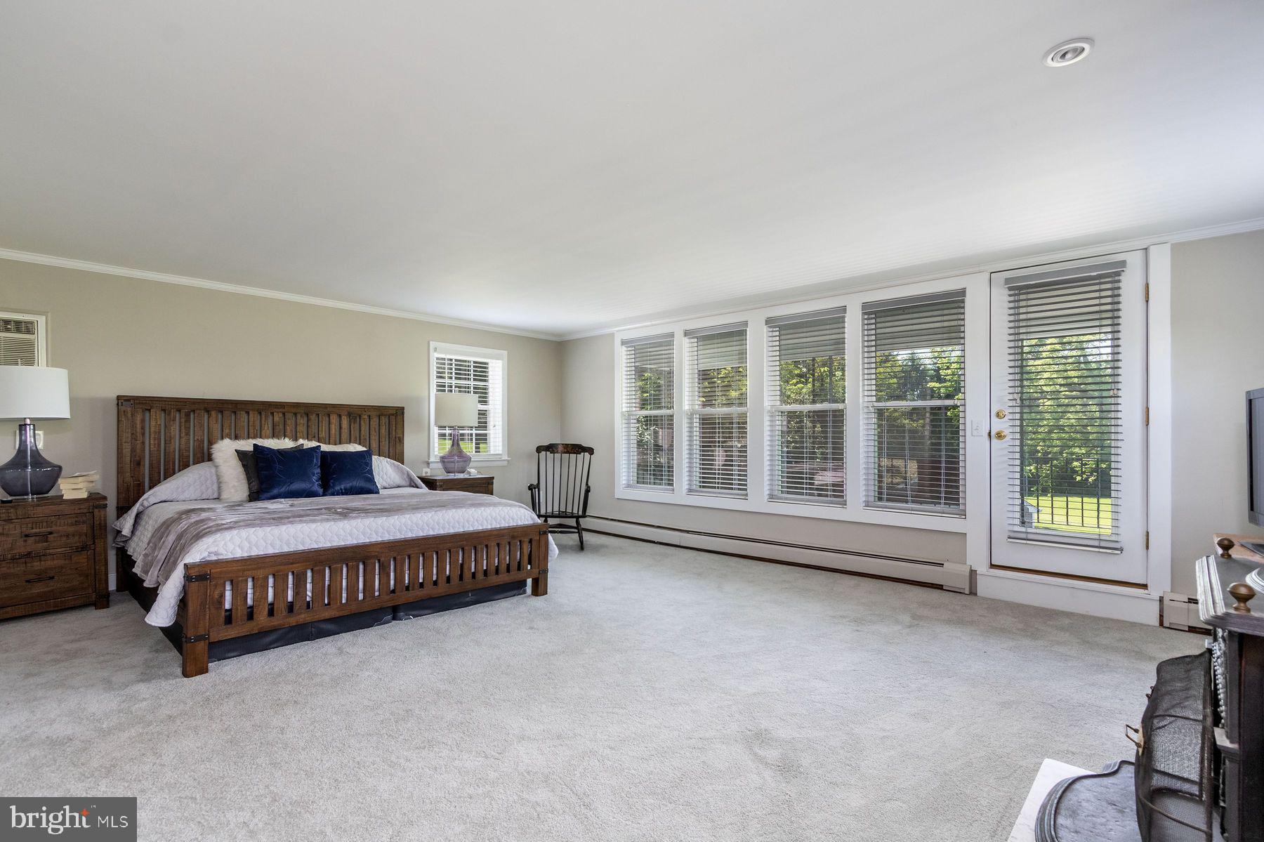 2349 Valley Road Jamison, PA 18929 - Photo 31 of 53 a spacious bedroom with a bed and a large window