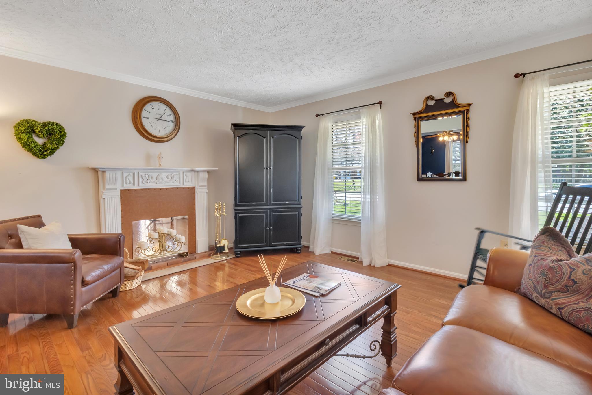 415 Beach Drive Annapolis, MD 21403 - Photo 12 of 54 Faux Fireplace Mantel and Tall Windows