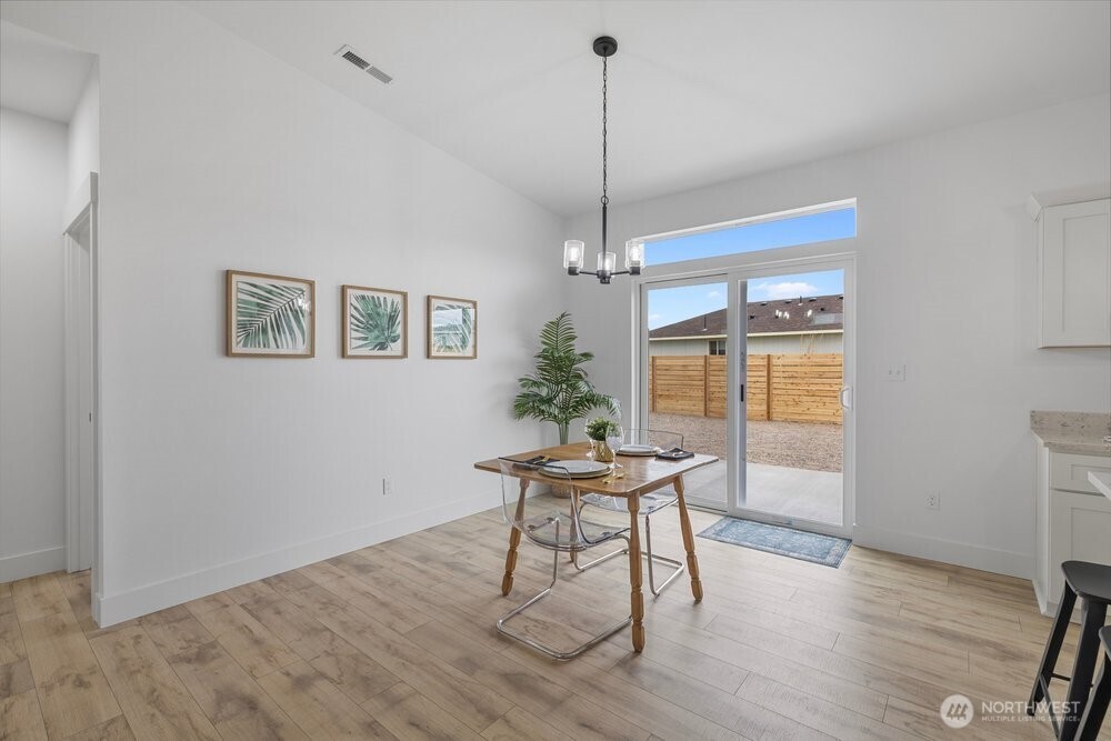 334 Spring Circle Mattawa, WA 99349 - Photo 9 of 40 a workspace with furniture window and wooden floor