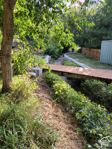 97 East Main Street Stockton, UT 84071 - Photo 20 of 58 View of yard with a bridge