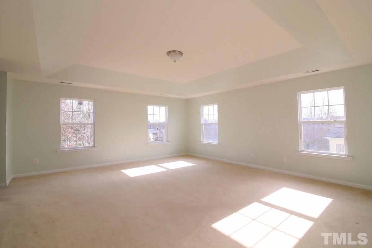 832 Seastone Street Raleigh, NC 27603 - Photo 15 of 25 a view of an empty room with a window