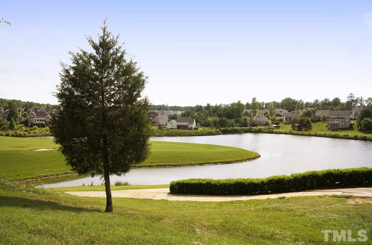 832 Seastone Street Raleigh, NC 27603 - Photo 23 of 25 a view of lake with green space