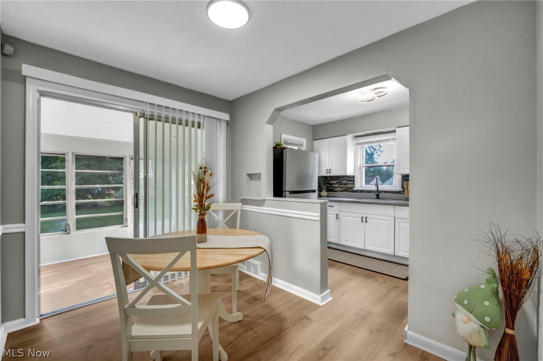 Wood-finish flooring throughout, providing a cohesive aesthetic