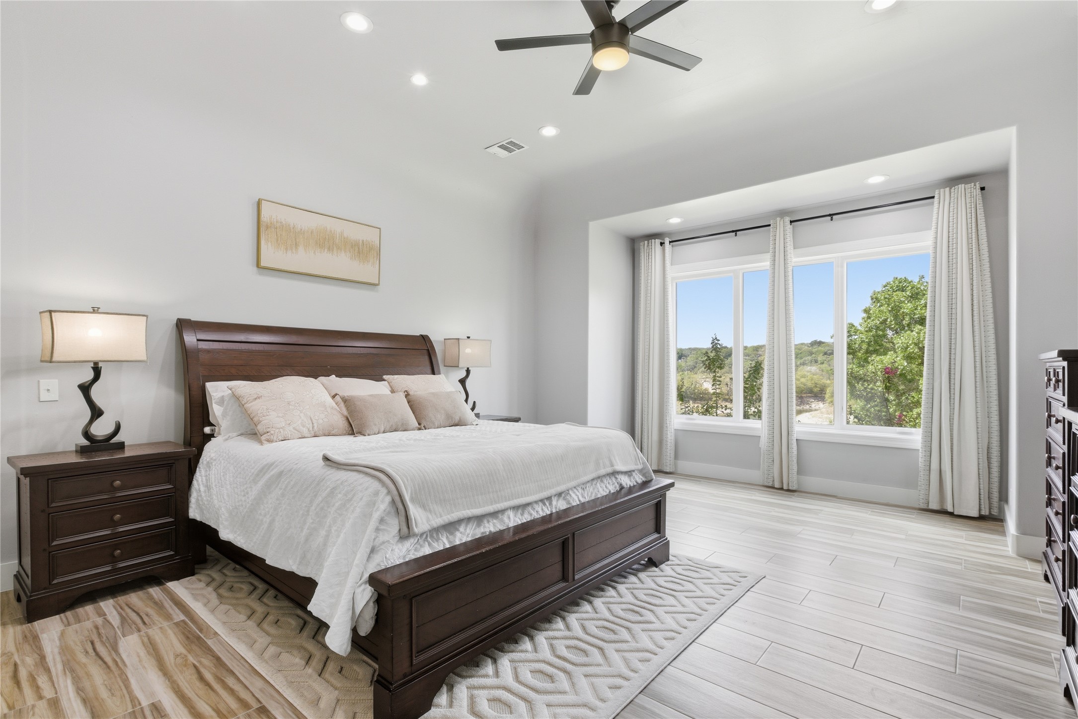 10716 Beach Road Leander, TX 78641 - Photo 14 of 39 Bedroom with recessed lighting, wood finish floors, and ceiling fan