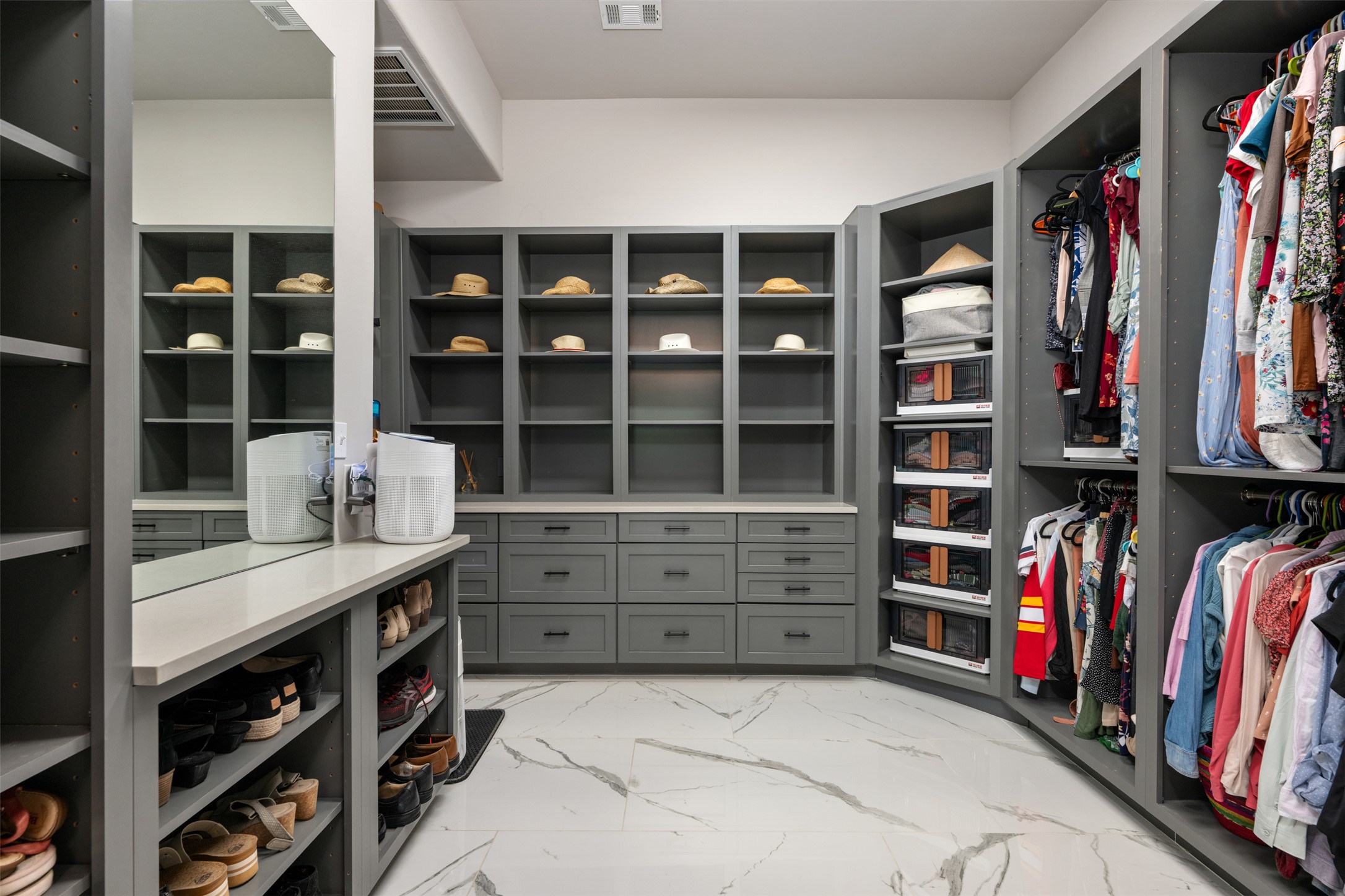10716 Beach Road Leander, TX 78641 - Photo 17 of 39 Spacious closet featuring light marble finish floors