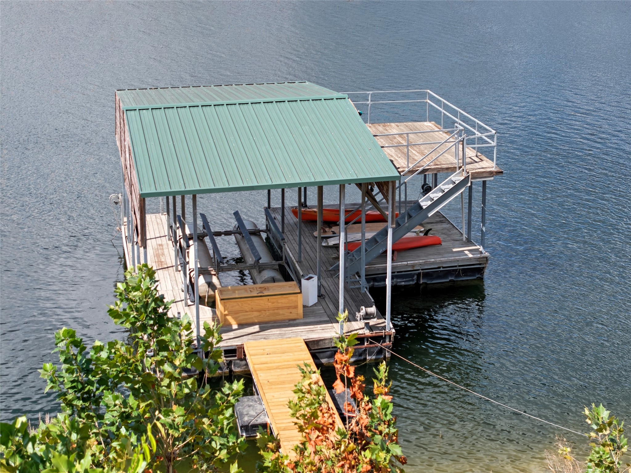 10716 Beach Road Leander, TX 78641 - Photo 28 of 39 Dock area featuring a water view and boat lift