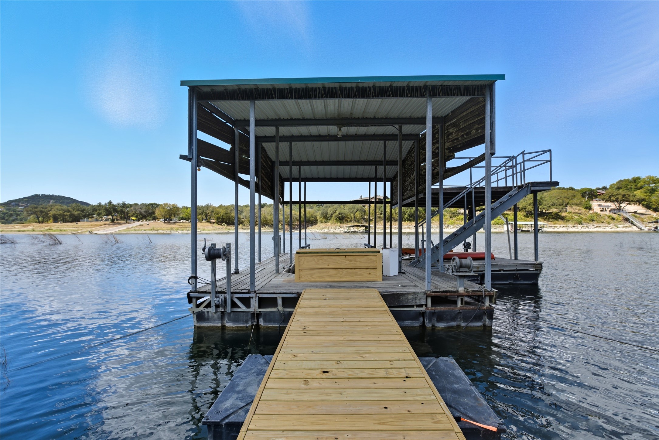 10716 Beach Road Leander, TX 78641 - Photo 3 of 39 Dock with a water view and boat lift