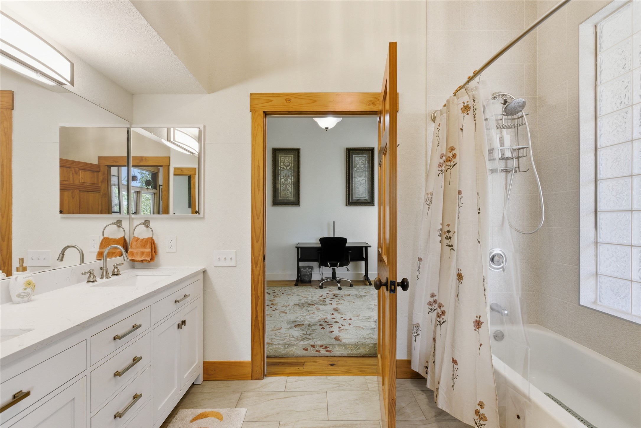 10716 Beach Road Leander, TX 78641 - Photo 37 of 39 Full bathroom featuring shower / bath combo and double vanity