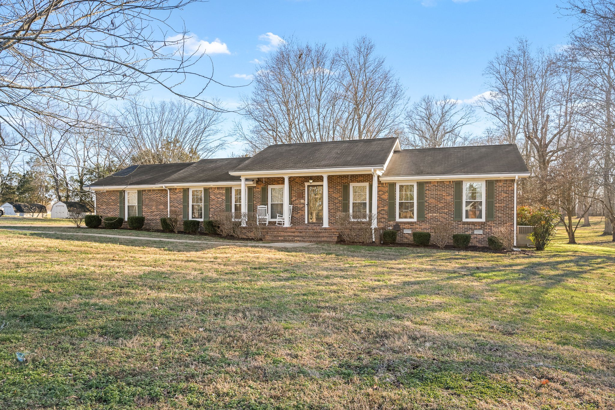 109 Hampshire Road Shelbyville, TN 37160 - Photo 1 of 55 a front view of a house with a garden
