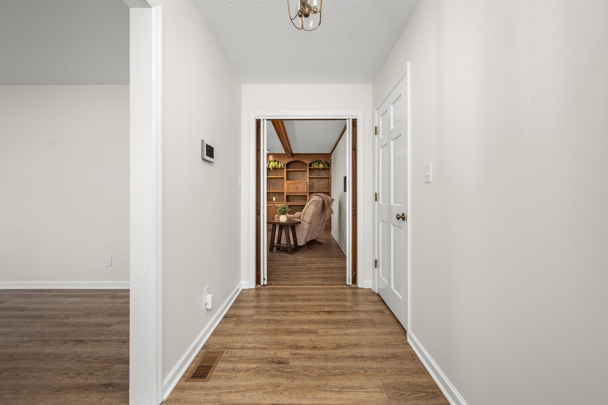 109 Hampshire Road Shelbyville, TN 37160 - Photo 11 of 55 a view of a hallway with wooden floor
