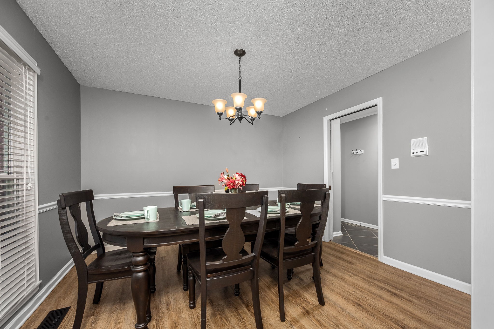 109 Hampshire Road Shelbyville, TN 37160 - Photo 15 of 55 a view of a dining room with furniture and wooden floor