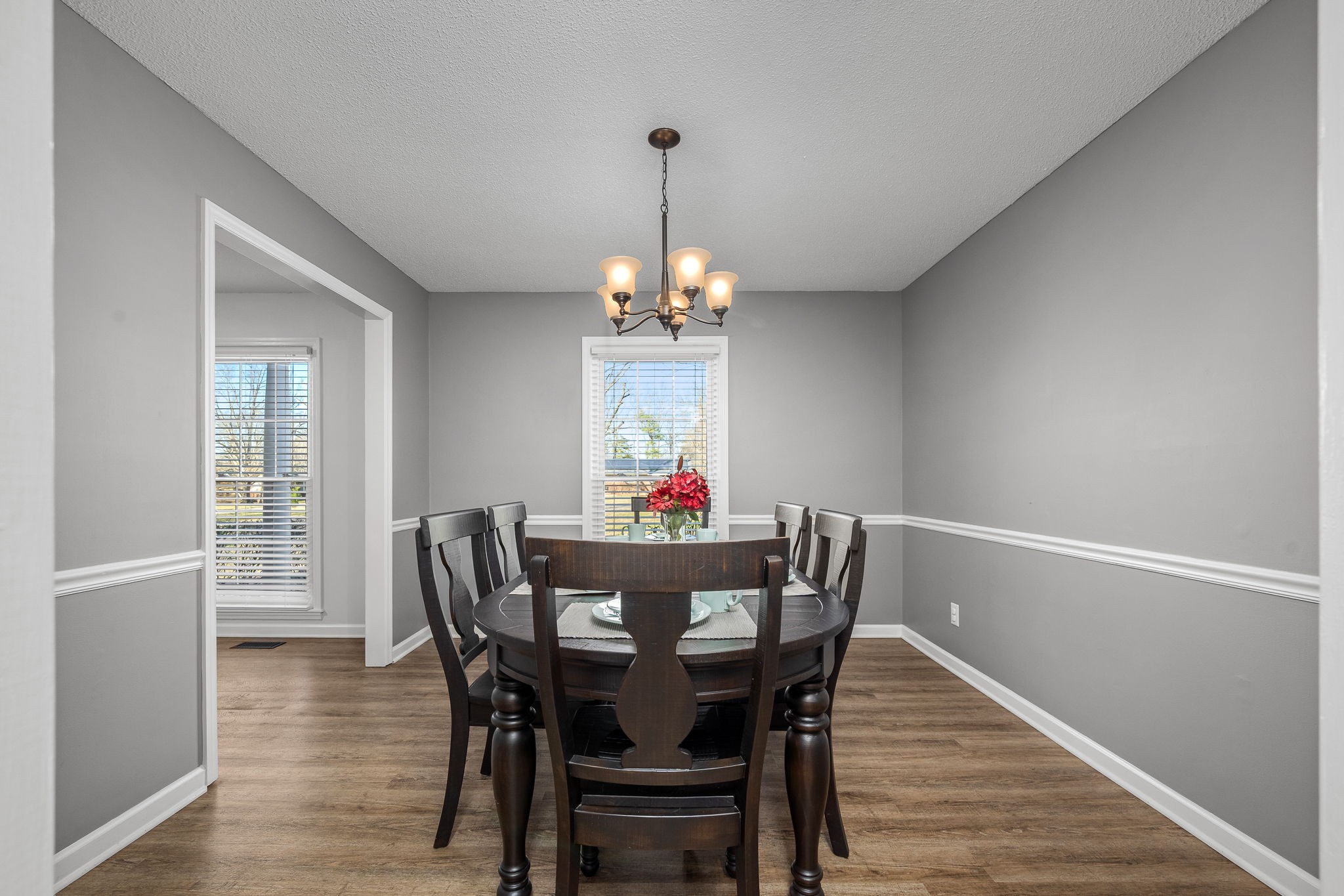 109 Hampshire Road Shelbyville, TN 37160 - Photo 16 of 55 a view of a dining room with furniture window and wooden floor