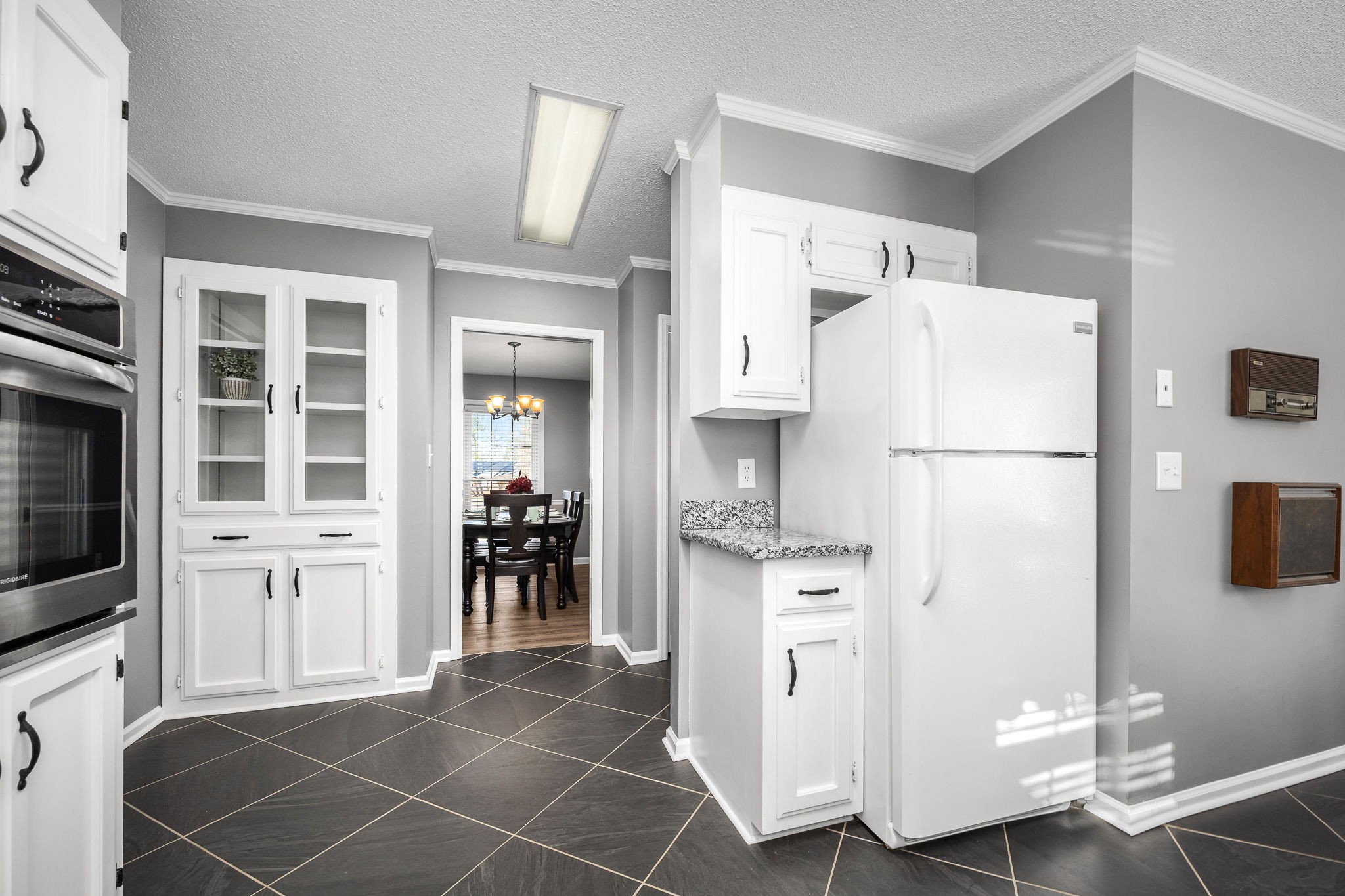 109 Hampshire Road Shelbyville, TN 37160 - Photo 19 of 55 a white refrigerator freezer and a stove sitting inside of a kitchen