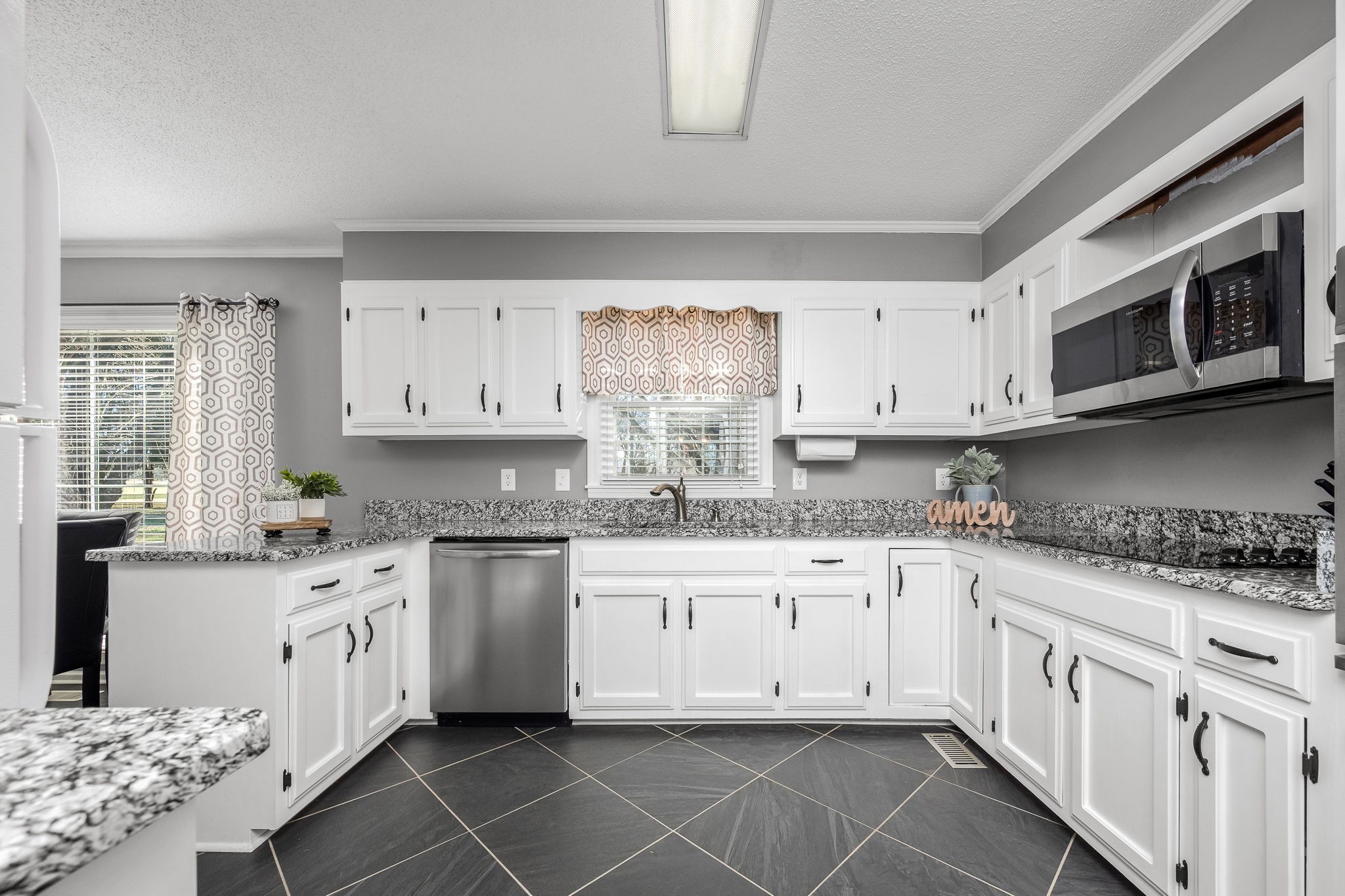 109 Hampshire Road Shelbyville, TN 37160 - Photo 21 of 55 a kitchen with stainless steel appliances granite countertop a sink and cabinets