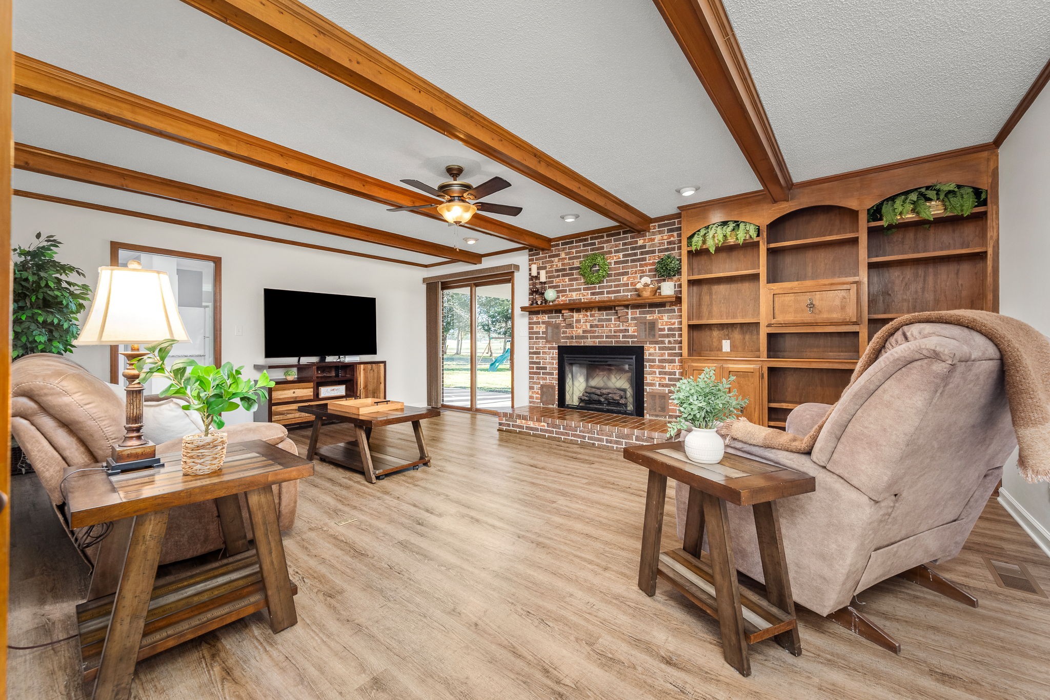 109 Hampshire Road Shelbyville, TN 37160 - Photo 27 of 55 a living room with furniture a flat screen tv and a fireplace