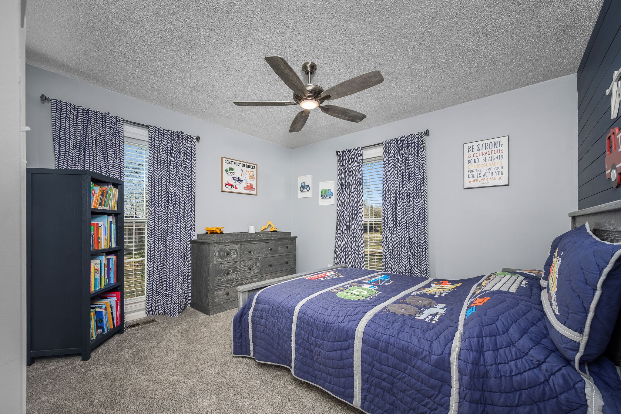 109 Hampshire Road Shelbyville, TN 37160 - Photo 35 of 55 a bedroom with a bed and a chandelier