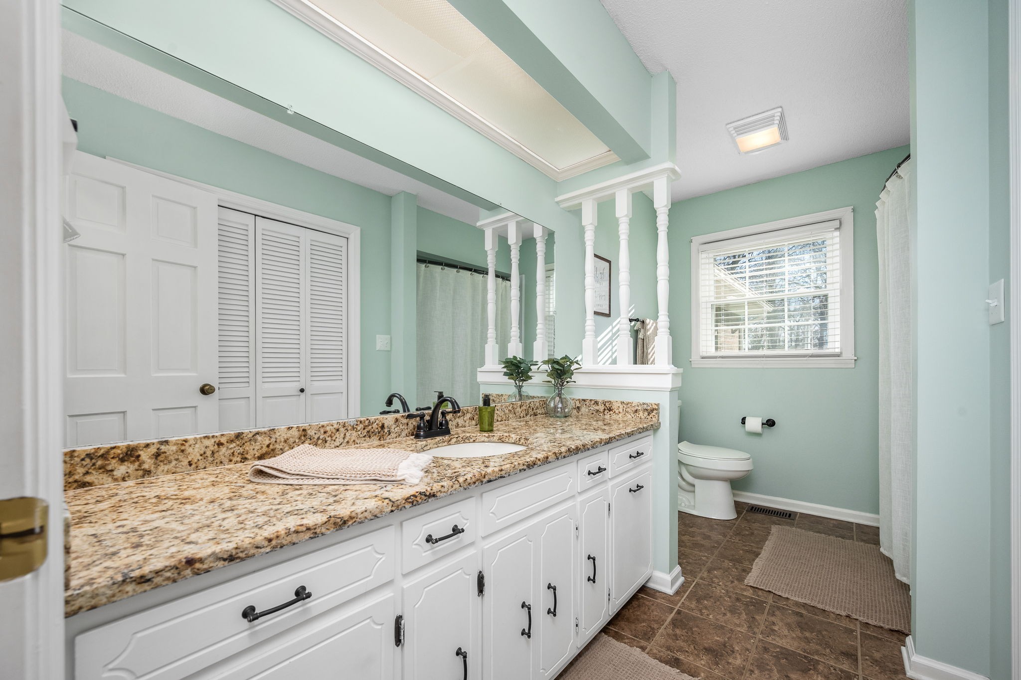 109 Hampshire Road Shelbyville, TN 37160 - Photo 36 of 55 a bathroom with a granite countertop sink mirror and toilet