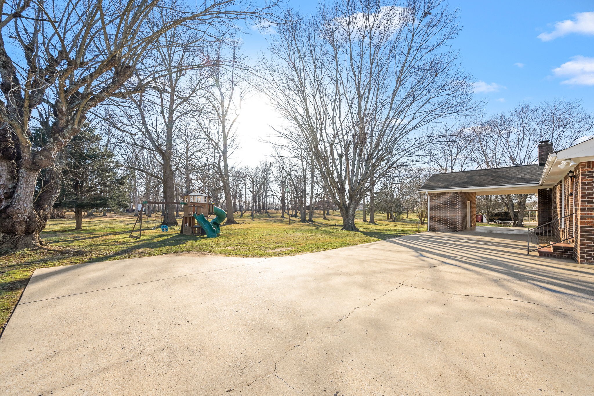 109 Hampshire Road Shelbyville, TN 37160 - Photo 43 of 55 a view of the house with a yard and trees