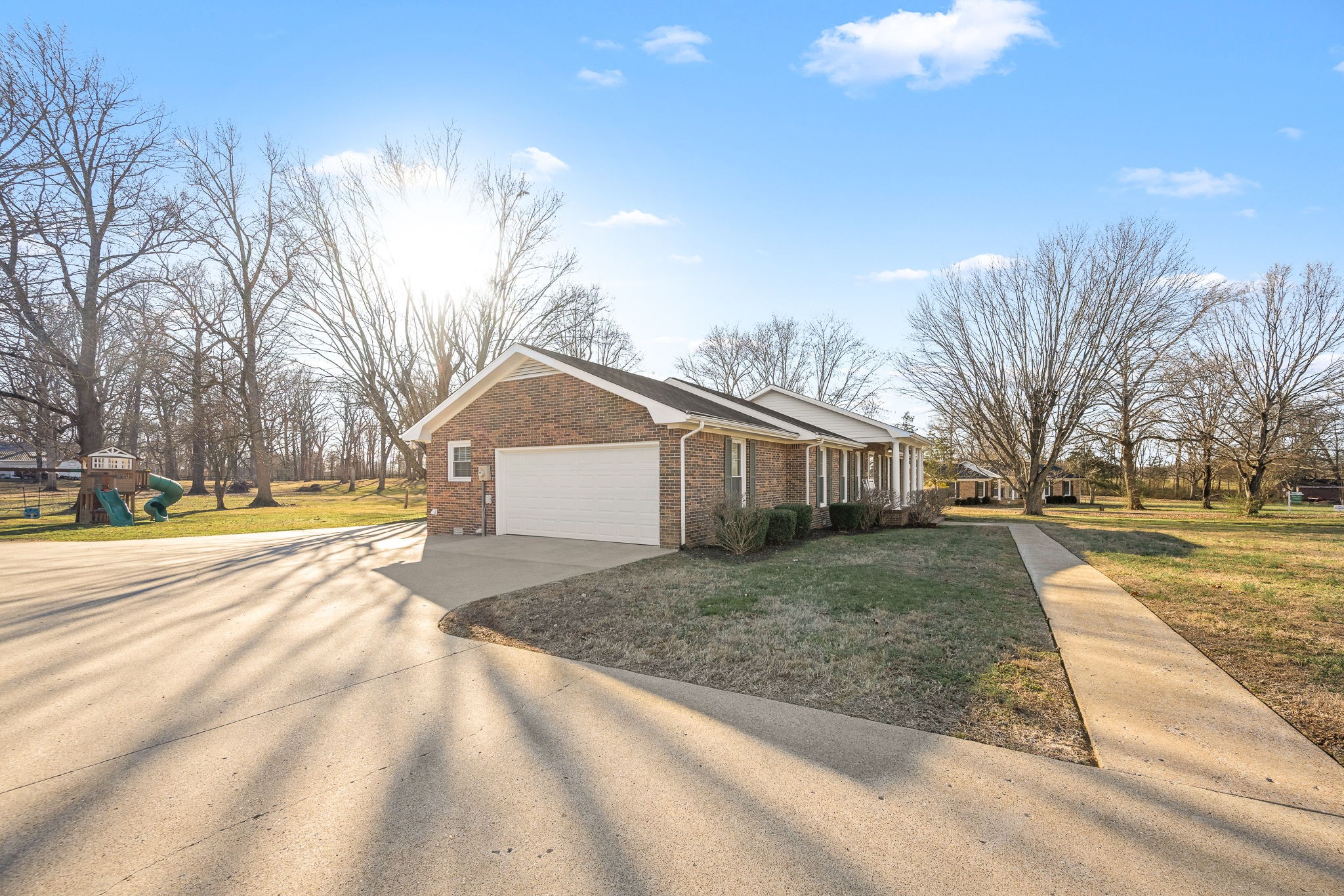 109 Hampshire Road Shelbyville, TN 37160 - Photo 5 of 55 a view of a house with a yard and large tree