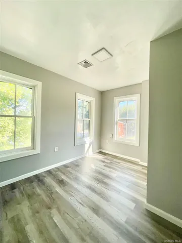 a bathroom with a bathtub and a sink