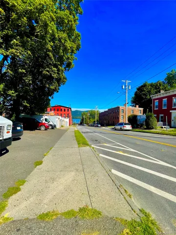 a cars parked on the side of a street