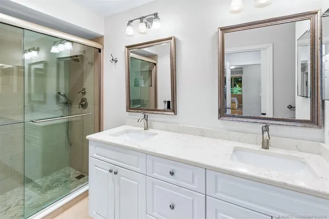 a view of kitchen with furniture and refrigerator