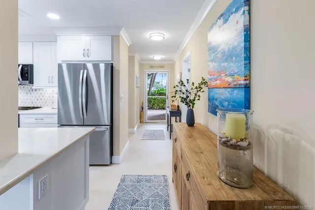 a view of swimming pool with outdoor seating and yard in back