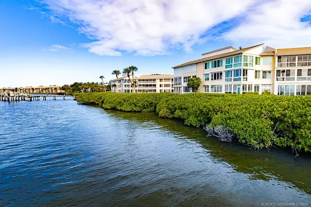 swimming pool view with a garden space