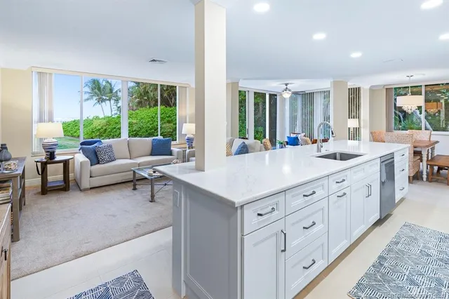 a room with furniture and a chandelier