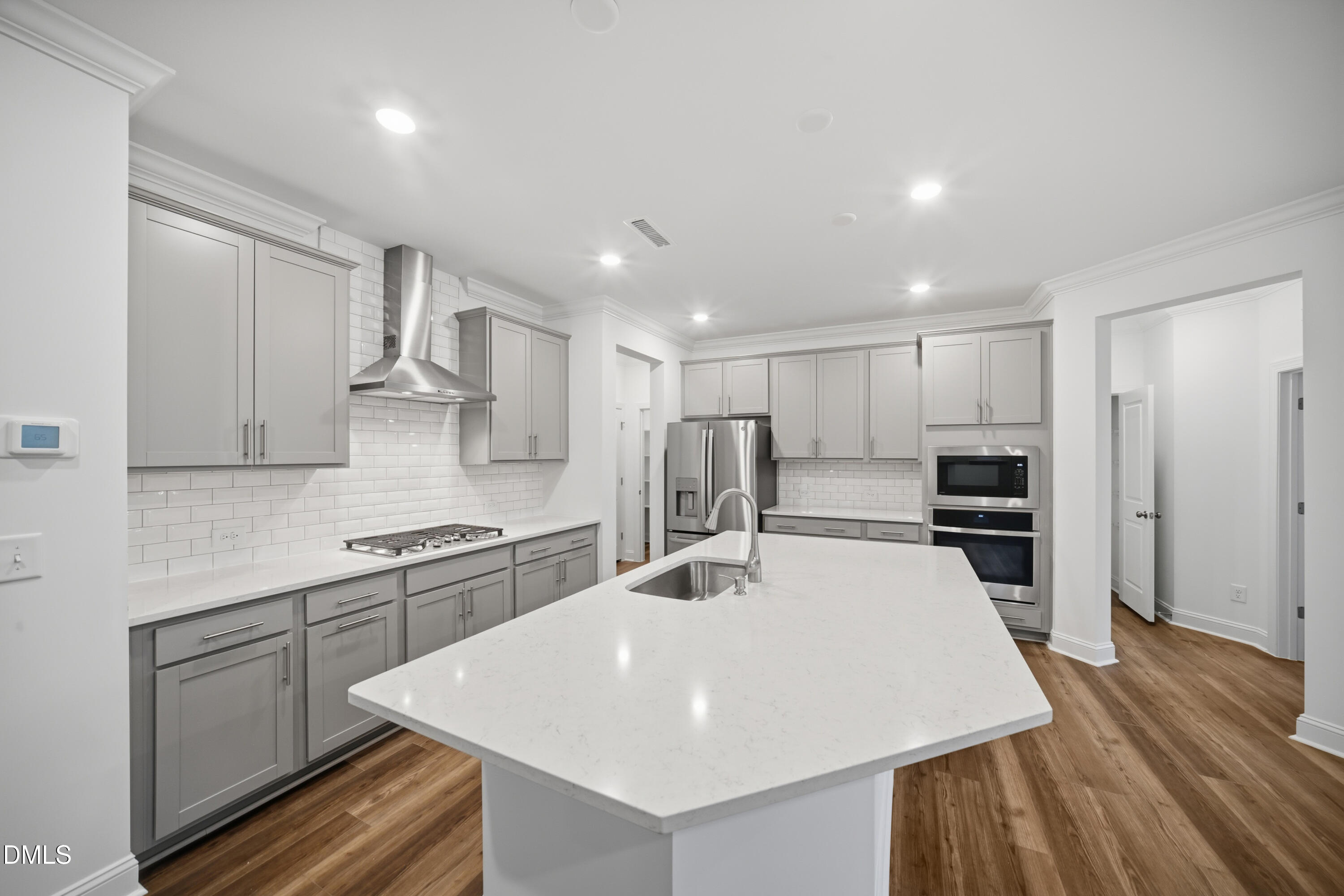 1516 Wader Circle Knightdale, NC 27545 - Photo 8 of 93 12_SUN_Stoneriver_Pic_GalvaniII_Kitchen_