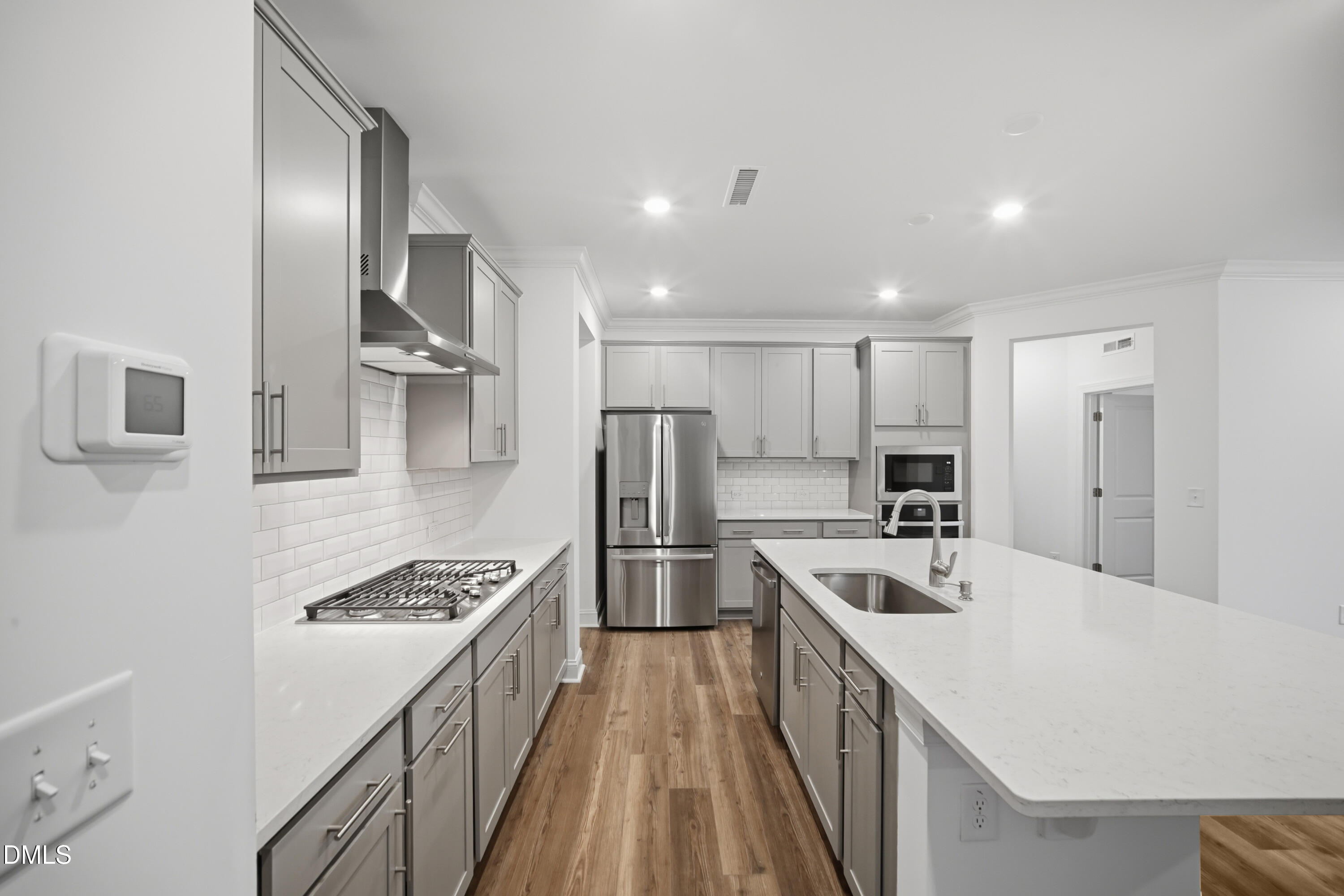 1516 Wader Circle Knightdale, NC 27545 - Photo 9 of 93 15_SUN_Stoneriver_Pic_GalvaniII_Kitchen_