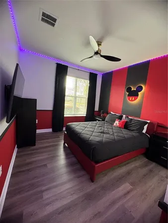 a bedroom with a bed and a closet