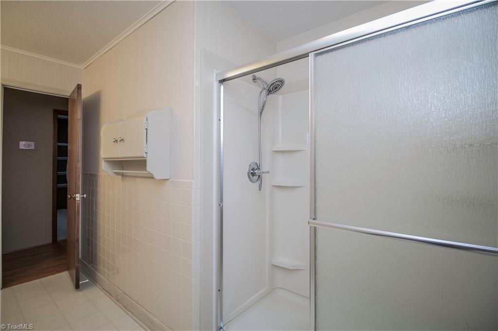 772 Bescher Chapel Road Trinity, NC 27370 - Photo 15 of 29 New walk-in shower in the hall bath.